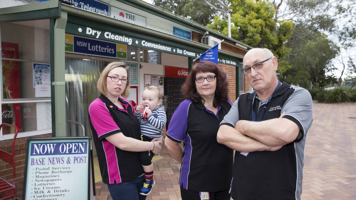 RAAF Newsagency and Post Office licensee Trevor Smith with his wife Linda, daughter Rachel and grandson Zachary at the Richmond base.  
Picture: Geoff Jones