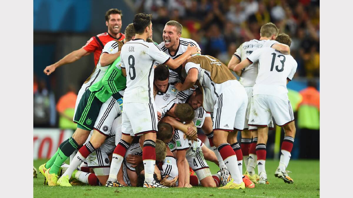 The German players celebrate winning the World Cup after the final whistle. Photos: Getty Images