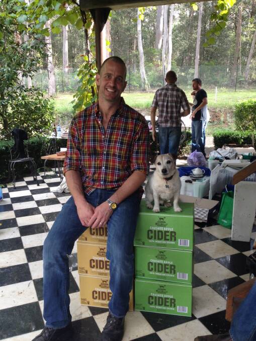 Better Homes and Gardens chef Fast Ed, takes a break with Hillybilly Hound, Frank, at Bilpin. 