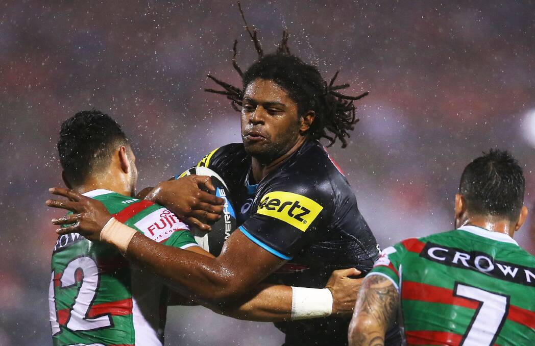 SYDNEY, AUSTRALIA - APRIL 11: Jamal Idris of the Panthers is tackled by Ben Te'o of the Rabbitohs during the round 6 NRL match between the Penrith Panthers and the South Sydney Rabbitohs at Sportingbet Stadium on April 11, 2014 in Sydney, Australia. (Photo by Brendon Thorne/Getty Images)