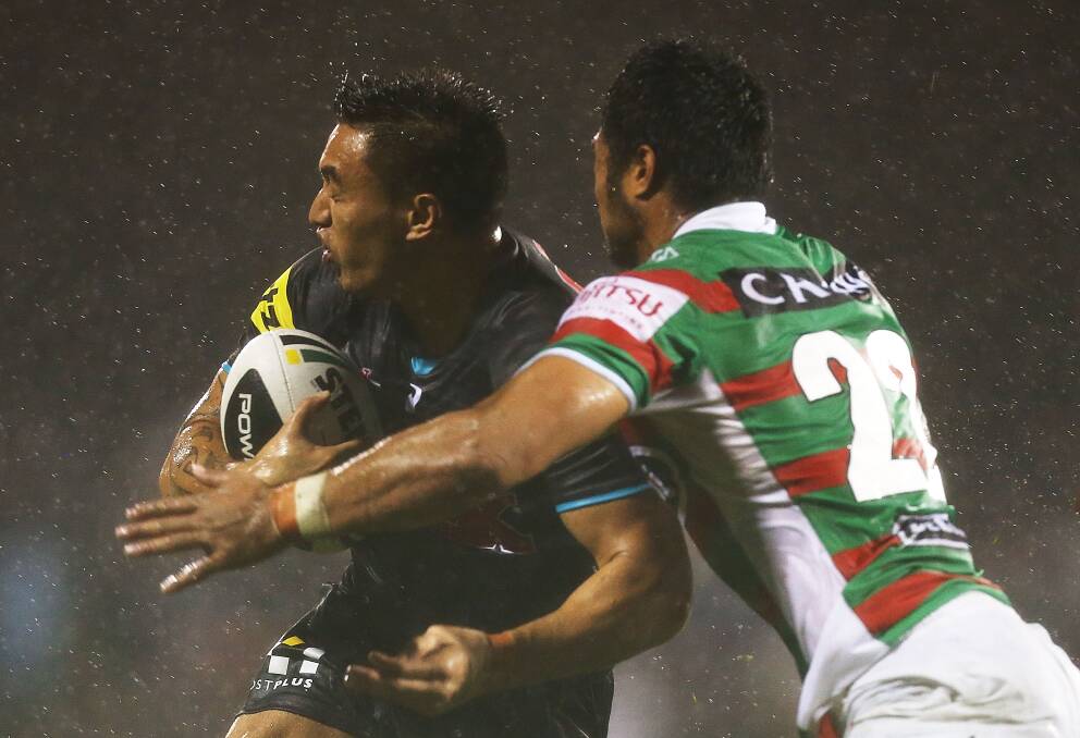 SYDNEY, AUSTRALIA - APRIL 11: Dallin Watene-Zelezniak of the Panthers is tackled by Kirisome Auva'a of the Rabbitohs during the round 6 NRL match between the Penrith Panthers and the South Sydney Rabbitohs at Sportingbet Stadium on April 11, 2014 in Sydney, Australia. (Photo by Mark Metcalfe/Getty Images)
