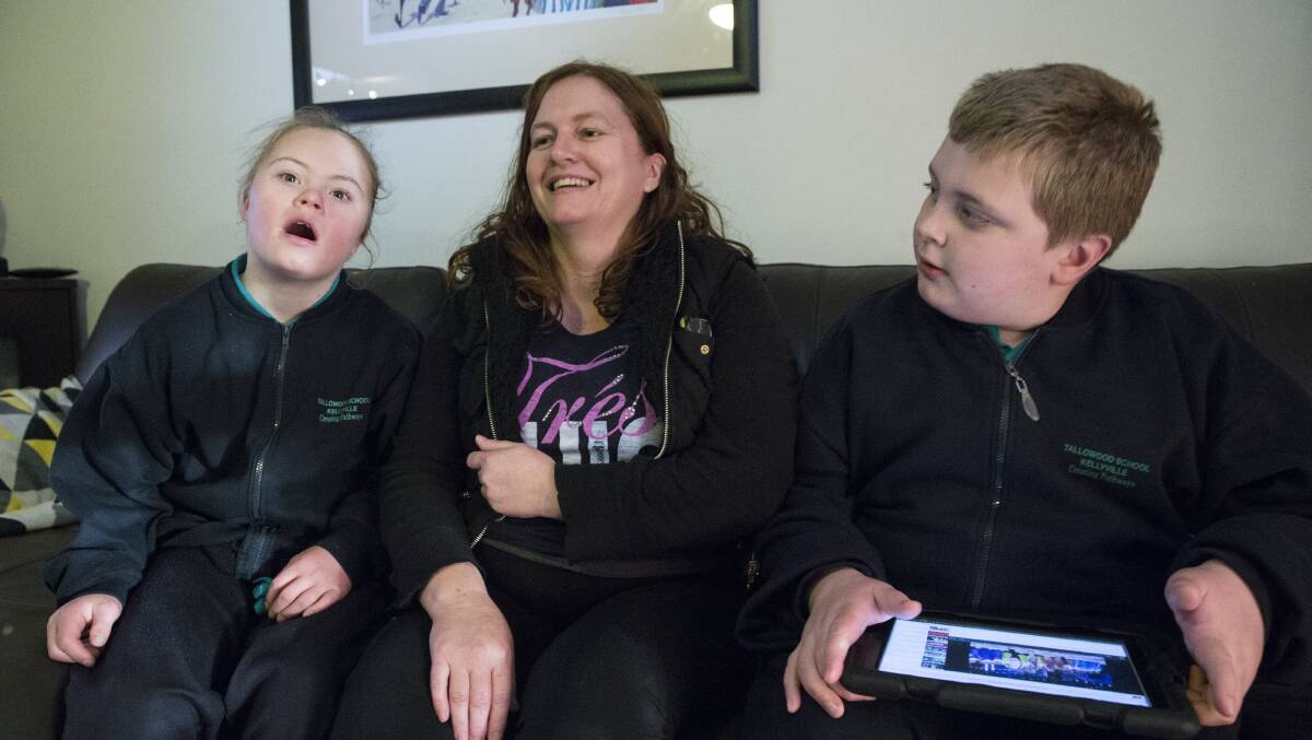 Love and the NDIS:  Sharon Debrincat says the NDIS trial in the Hawkesbury should make a significant change in the lives of herself and her children, Tahleah and Owen.  Picture: Geoff Jones