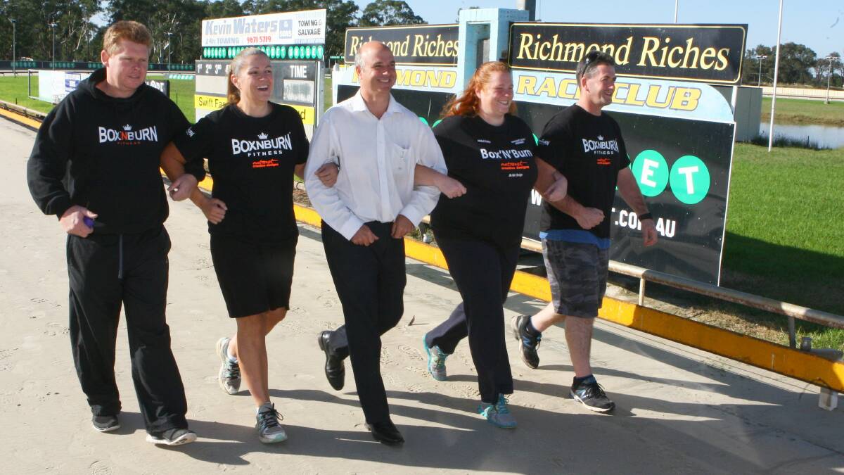 Beating cancer and cerebral palsy: The Relay for Life Box 'N' Burn team, from left, Mark Hardman, Jacinta, Richmond Race Club manager Wayne Billett and Georgie and Ross Currant. Picture: Gary Warrick
