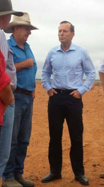 Tony Abbott and Bourke farmer Phil Ridge this morning. Photo: Grace Ryan
