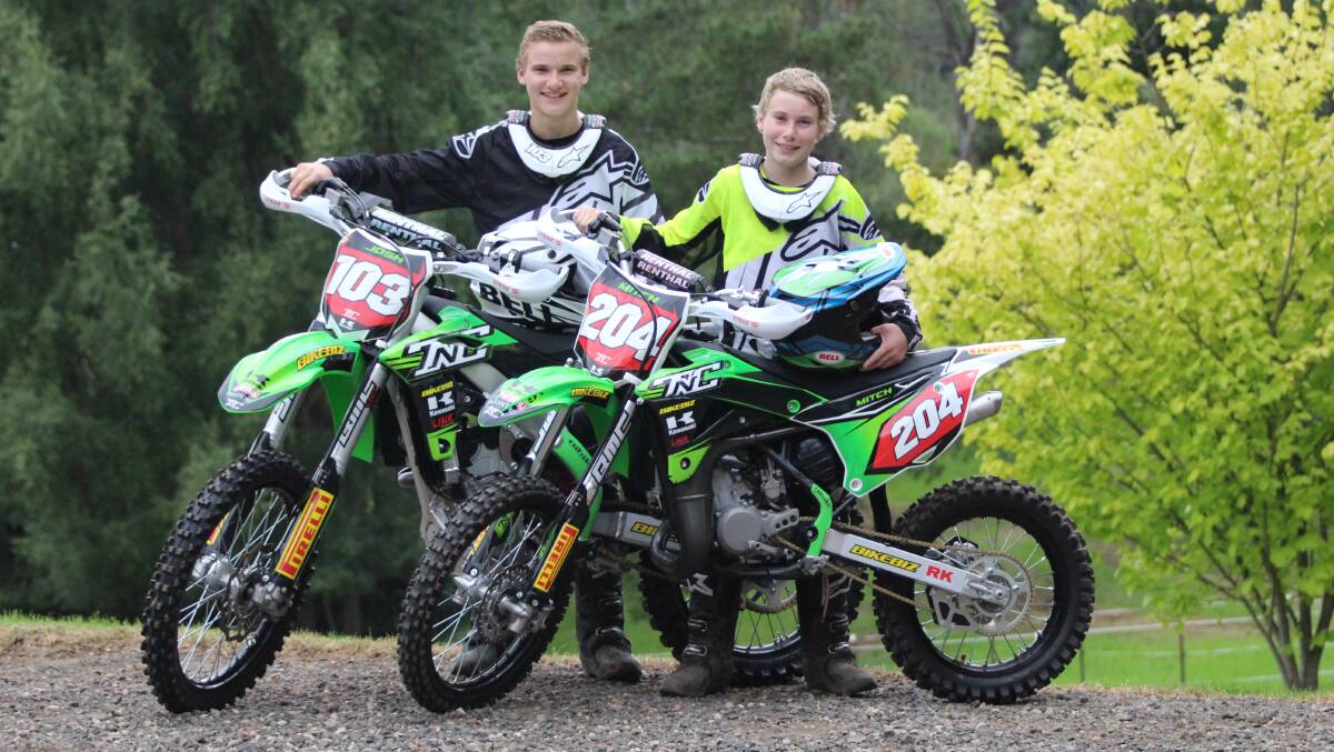 Twin brothers Josh, #103, and Mitch #204, with the bikes they used in the Australian Off-Road Championship. Picture: Rebecca Brierley