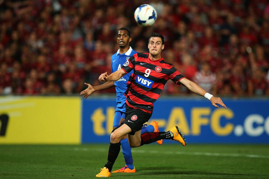Tomi Juric shapes for a kick on goal for the Western Sydney Wanderers during the Asian Champions League final in 2014. The Wanderers’ A-League season starts tomorrow night. Picture: Getty Images