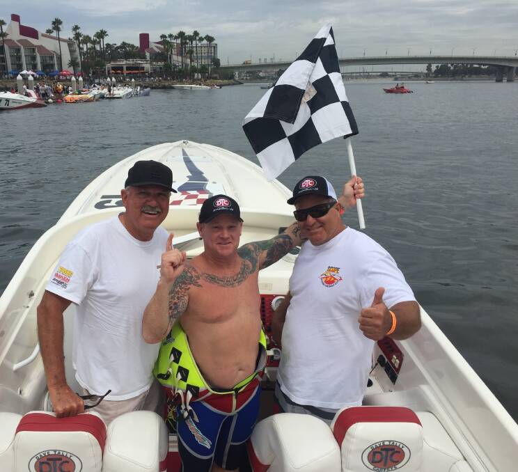 Kevin Vahtrik, centre, celebrates winning his class in the 67th Catalina
Water Ski Race, flanked by boat driver, right, Dave Tally and navigator Stan
Leder. Simon McMah, who was Vahtrik’s observer during the race is not
pictured. Picture: Supplied