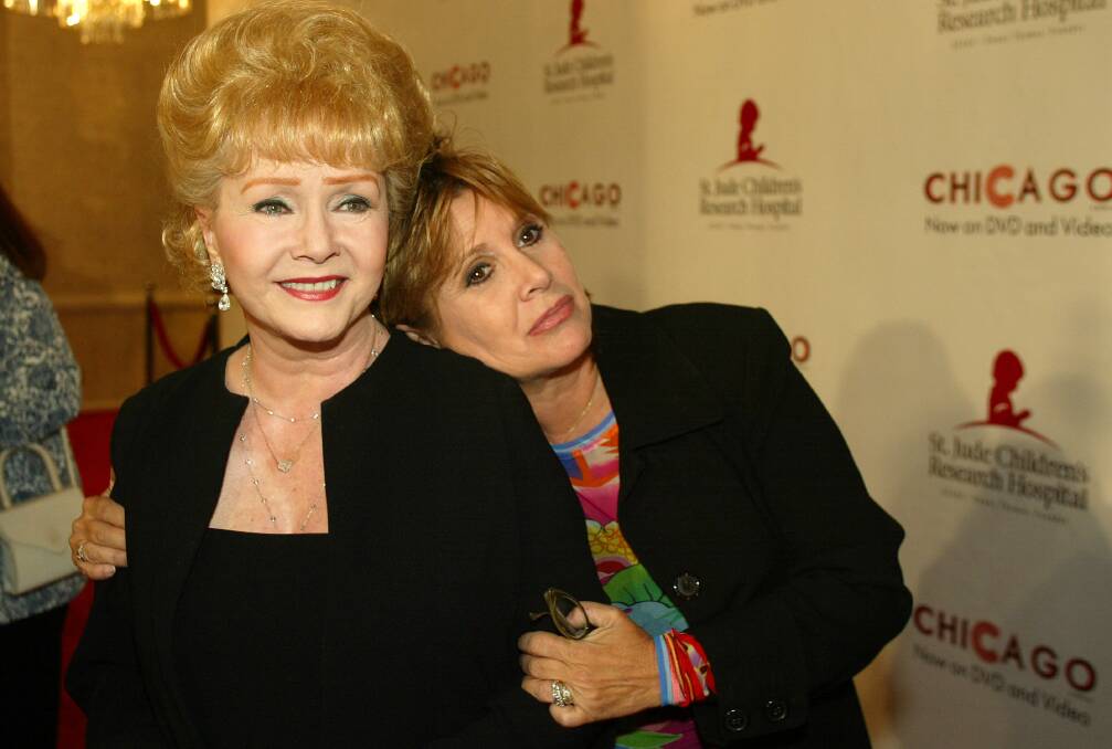 MOTHER & DAUGHTER | Debbie with Carrie Fisher.