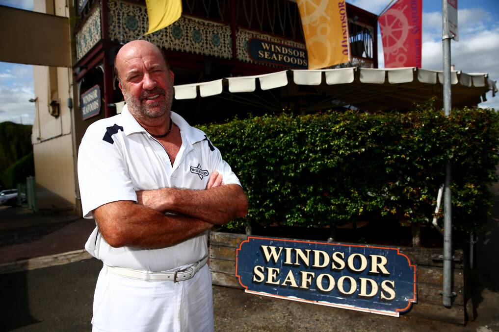 FROM HAIR TO FISH: Windsor Seafoods owner Barry Lane. Picture: Geoff Jones