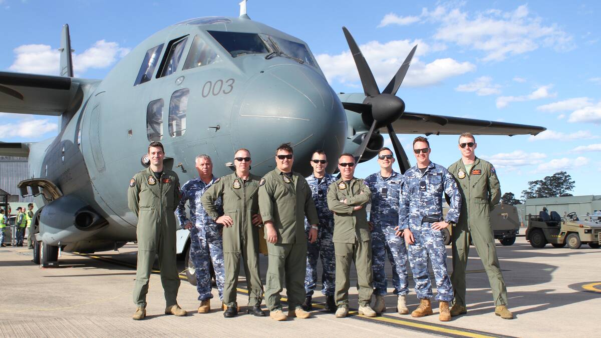 FLYING HIGH: Richmond RAAF personnel with the new C-27J Spartan. Picture: RAAF