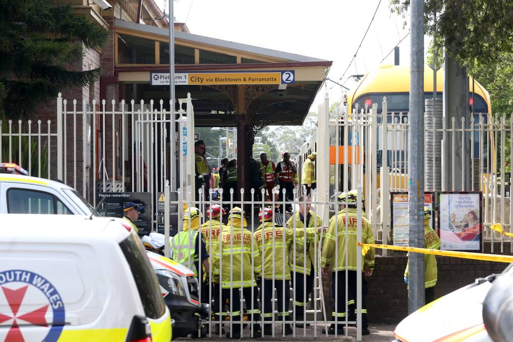 Rescue services attend the scene of a train accident at Richmond railway station. Picture: Geoff Jones