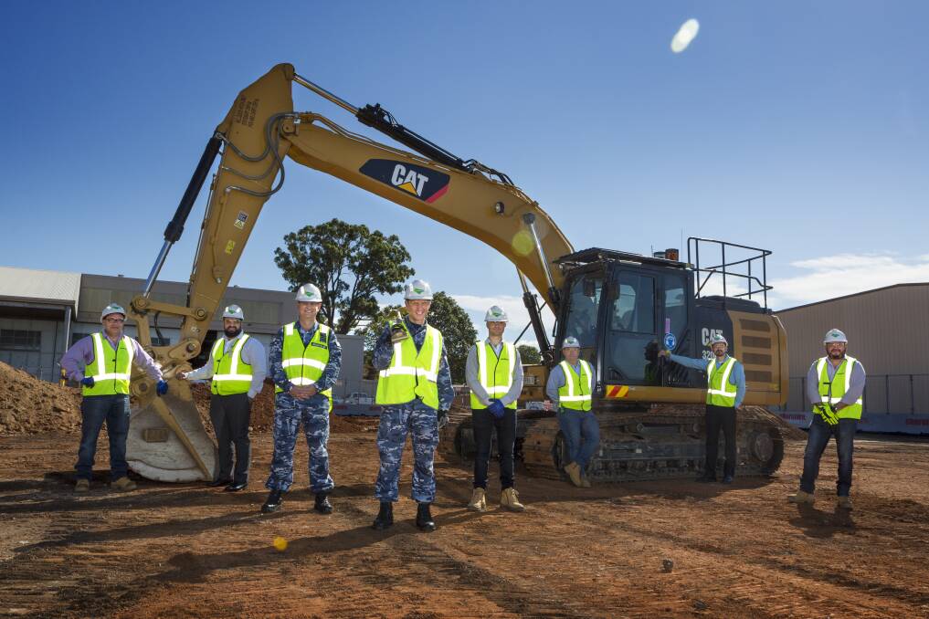 Members of the new RAAF Base Richmond Air Traffic Control tower construction team, including Royal Australian Air Force personnel and Lend Lease employees, during the ground breaking ceremony at RAAF Base Richmond.