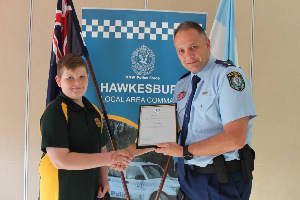 APPRECIATION: Craig Black presented with a certificate of appreciation from Hawkesbury Police Commander Grant Healy for his collection of nearly 1,600 tubs of Play-Doh for sick kids.
