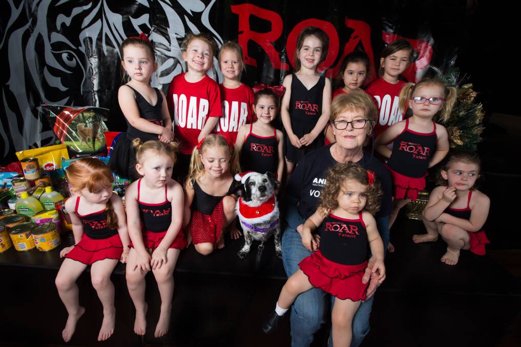 Leonie Elvin president of the Hawkesbury Valley Animal Welfare Branch with Roar's Tiny Tot Dancers who have put together a christmas donation. Picture: Geoff Jones