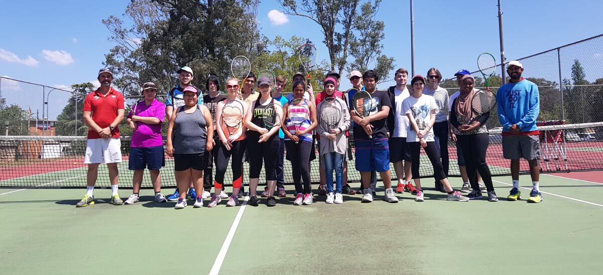 Trainees take on tennis clinic