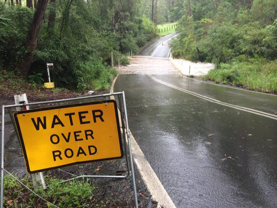 FLOOD DANGERS: The SES is frustrated with drivers ignoring road closure signs following flooding on some local roads in and around the Hawkesbury area recently. Picture: Hawkesbury SES Facebook.