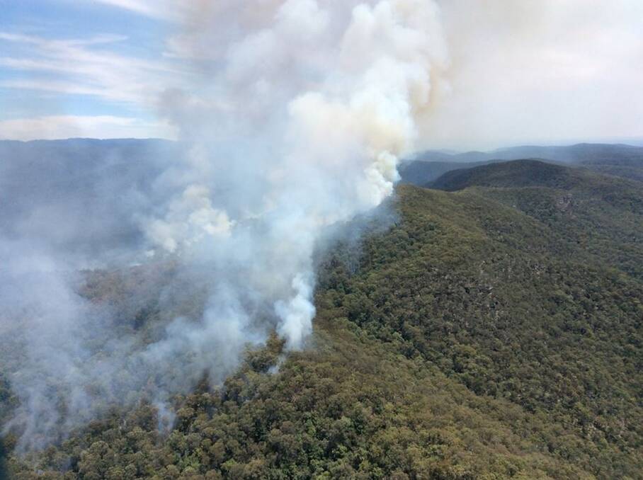 BE READY: A fire seen burning on Saturday during extreme heat within the Lithgow Local Government Area at Main Creek, which is about 12km from Colo Heights. Picture: Hawkesbury RFS Facebook.