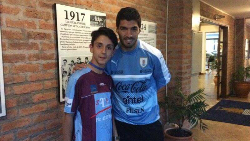 Allen Yuletian-Taedeo wearing his Hawkesbury City jersey with FC Barcelona's Luis Suarez. Picture: Supplied