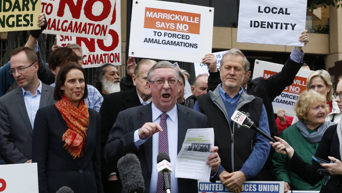 FIRED UP: Peter Primrose addresses an anti-amalgamation rally in front of Parliament House in 2015. Picture: Peter Rae