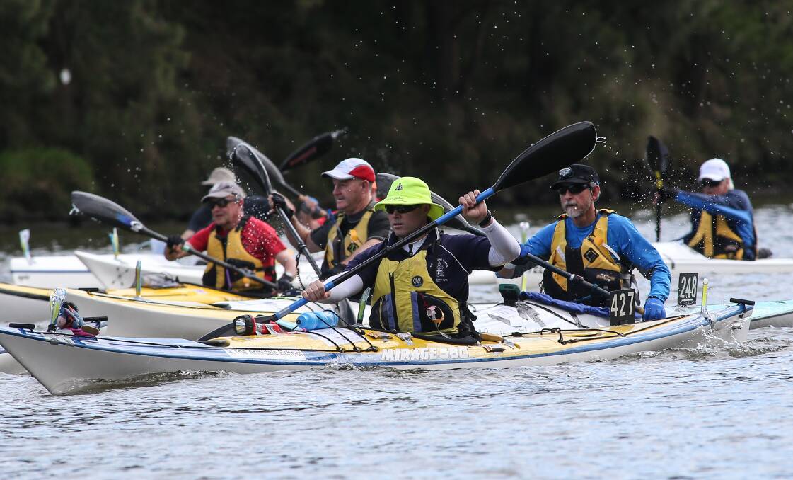 THEY'RE OFF: Paddlers start their race near Governor Phillip Park during last year's Hawkesbury Canoe Classic. Picture: Geoff Jones
