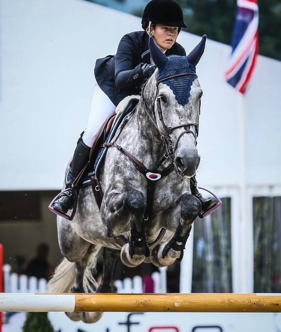 LEAPS: Jamie Winning-Kermond of Ebenezer on her mare, Zarissa, as the pair compete in Spangenberg, Germany. She will compete at Equifest, which satrts tomorrow. Picture: Jenny Sheppard