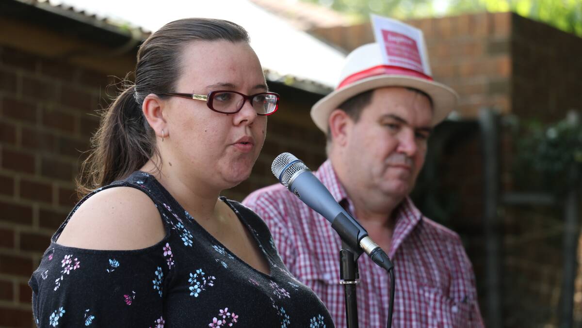 Kate Guillaumier addresses the rally at Richmond Oval, with Stuart Gale in the background. Picture: Supplied