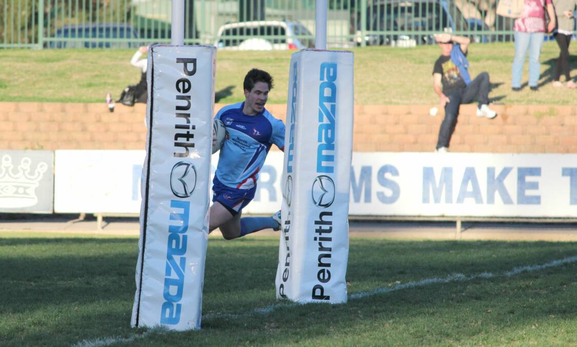 FAMILIAR TERRITORY: Robert Duff scores one of his four tries for Hawkesbury City in Sunday's grand final win over Doonside. Picture: Conor Hickey