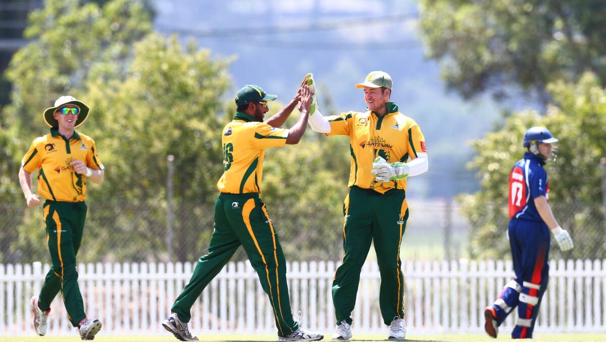 BOWLED: Jas Cheema, left, playing first grade. Picture: Geoff Jones