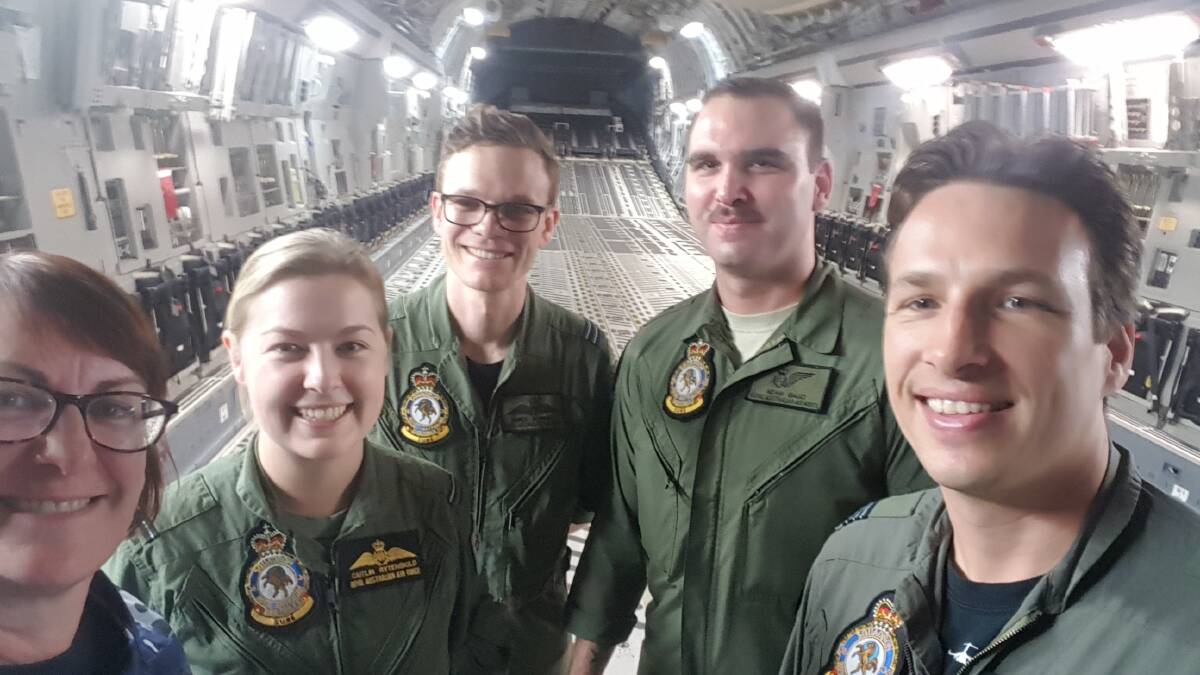 Susan Templeman poses for a selfie with some RAAF members, during a week which she spent at RAAF Base Amberley in Queensland. Picture: Supplied