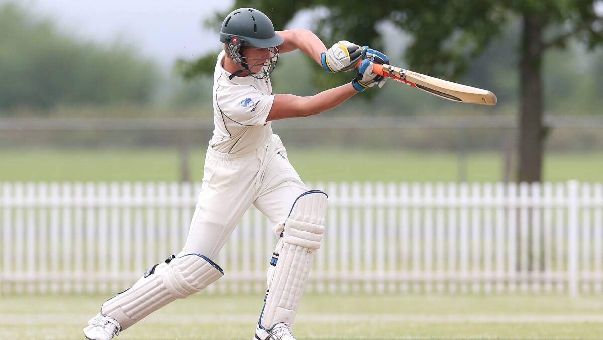 SHOT: Aiden Van Den Nieuwboer swings out against Sutherland in second grade for the Hawkesbury Cricket Club. Picture: Geoff Jones