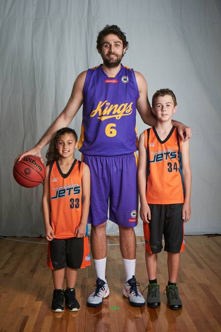 Julian Khazzouh with two Hawkesbury basketballers. Picture: Supplied