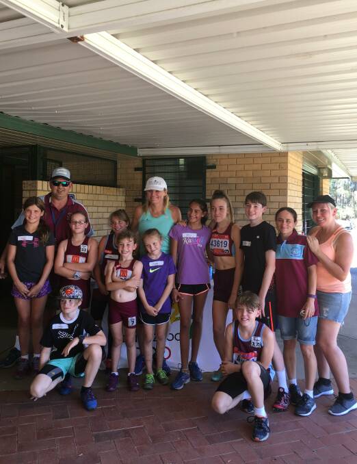 Melinda Gainsford-Taylor, green top, with Hawkesbury City Little Athletics members at the weekend. Picture: Supplied