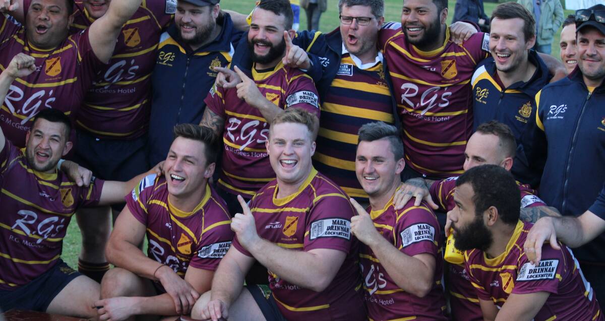 ELATED: Hawkebsury Ag College's first grade team celebrates their grand final win. Picture: Conor Hickey