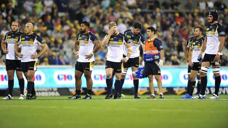 ACT Brumbies players react to their loss against the Queensland Reds at Canberra Stadium. Photo: Melissa Adams