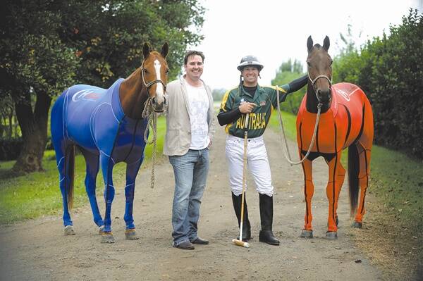 Suit yourself: Hidez inventor Matt Spice with Australian polo player Kelvin Johnson with  horses Kelly and Larry suited up. Photo: Kylie Pitt