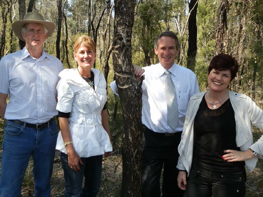 Wayne Olling and Lisa Harold from the Cumberland Conservation Network, with Londonderry MP Bart Bassett and Minister for the Environment Robyn Parker at the Wianamatta Regional Park, St Marys.
