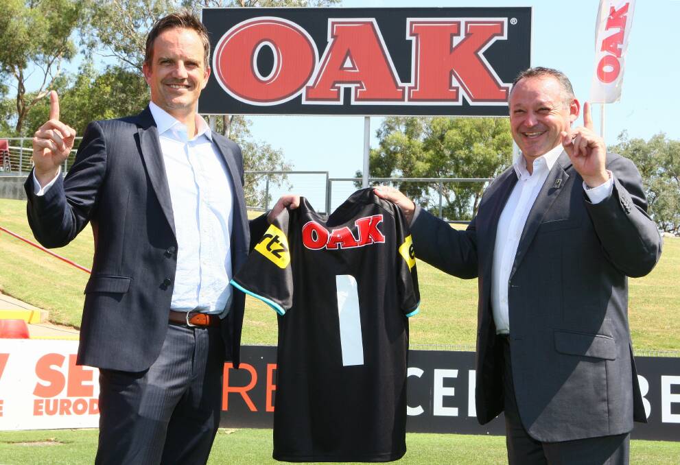Justin Pascoe and general manager of rugby league Phil Moss inside the Penrith’s stadium after the Panthers are named the no.1 sporting brand in Australia. 