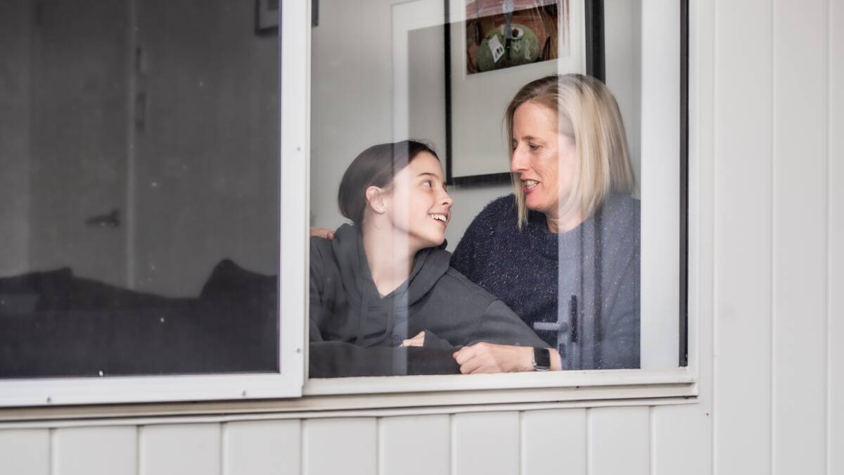 Senator Katy Gallagher at home in quarantine with daughter Evie who contracted COVID-19 earlier this year. Picture: Karleen Minney