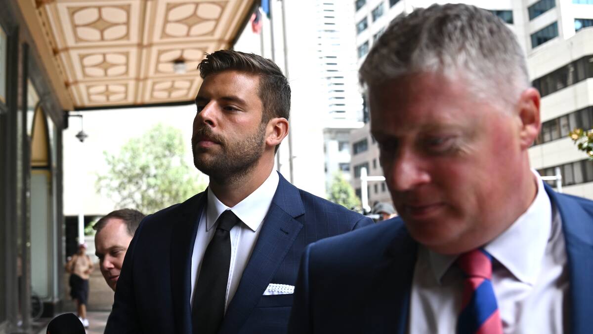 Daniel Keneally (left) arrives at the Downing Centre Local Court in Sydney, Thursday, February 1, 2024. Daniel Keneally, 25, is accused of fabricating evidence that lead to a Sydney man being charged by the fixated persons unit. (AAP Image/Dan Himbrechts)