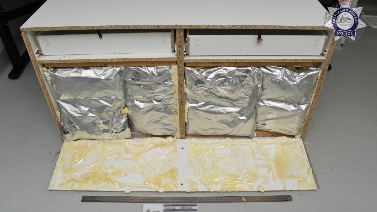Wooden cabinet allegedly packed with methamphetamines sent to Australia via Canada. Picture via AFP