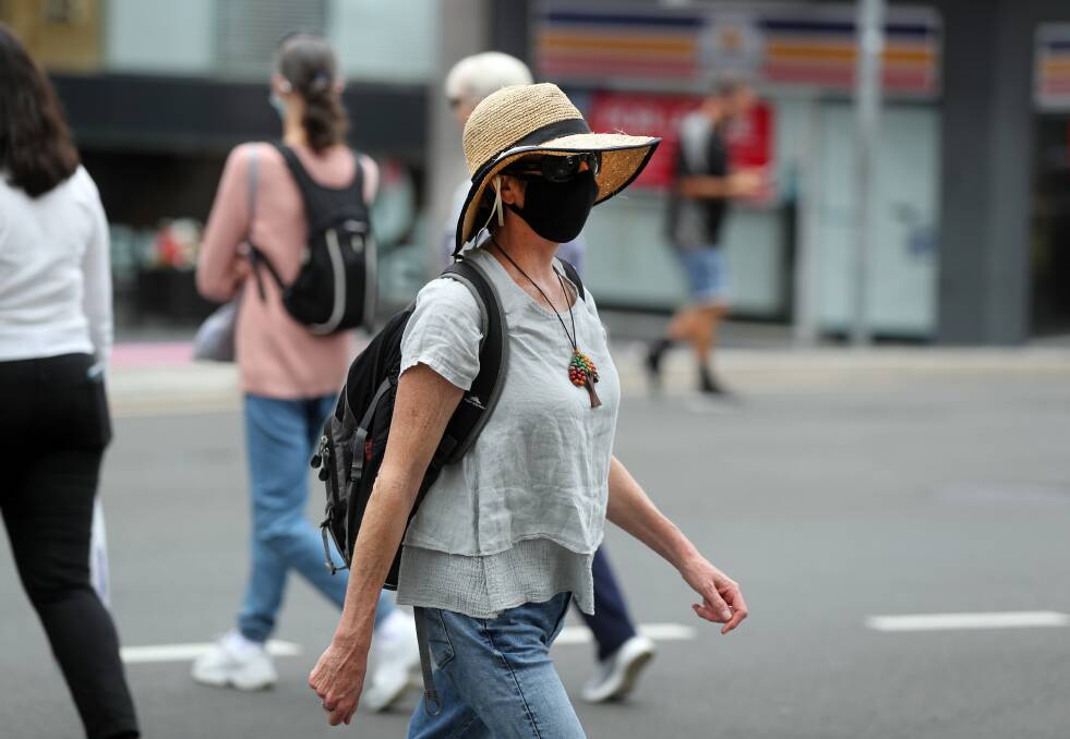 Shoppers in Wollongong's CBD wearing masks during 2020. Picture by Robert Peet. 