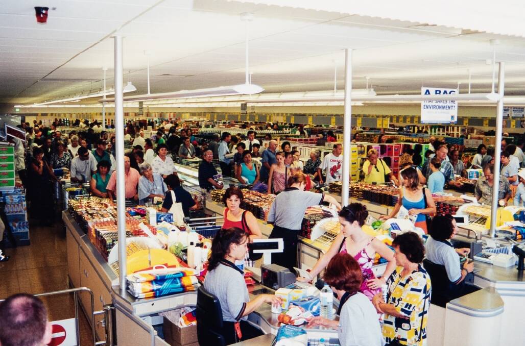 Aldi opened its first stores in Australia in 2001, the first two in Sydney, including this one in Bankstown Airport on its bumper opening day 20 years ago. Picture: Supplied