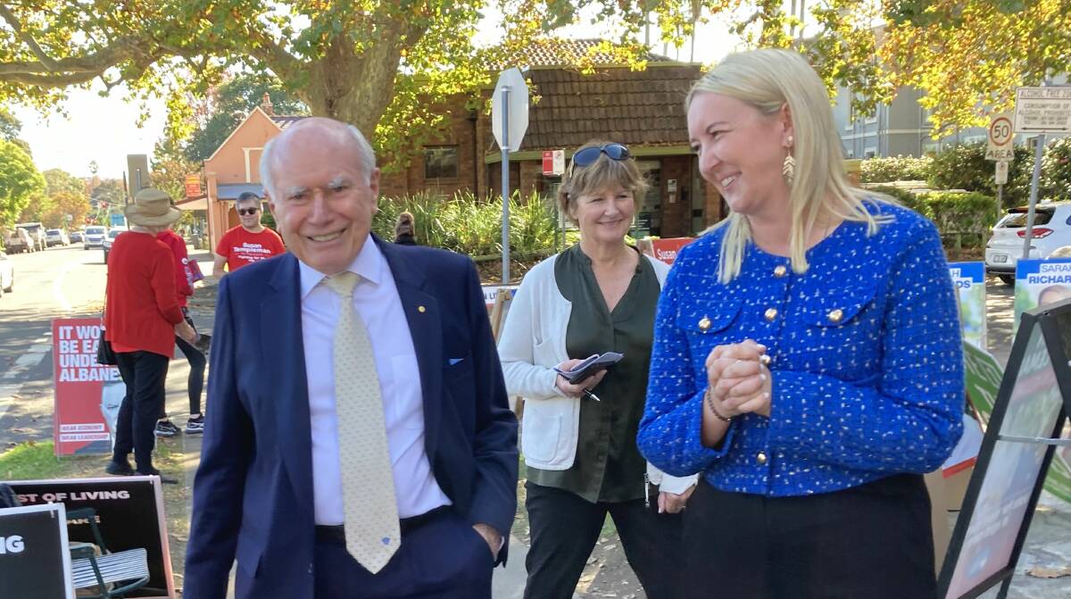 Former Prime Minister, John Howard, and Liberal candidate for Macquarie, Sarah Richards, outside the early voting centre at The Richmond School of Arts. Picture: Supplied.