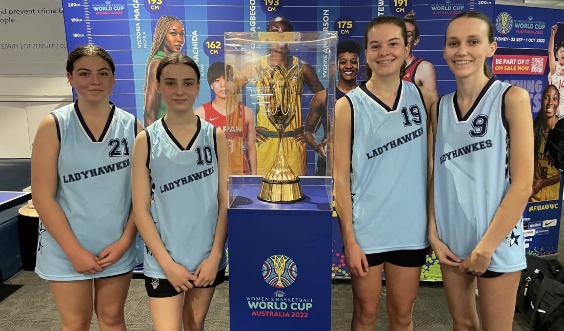 Inspiring: Hawkesbury team, Ladyhawkes, with the FIBA Women's Basketball World Cup trophy. Picture: Supplied.