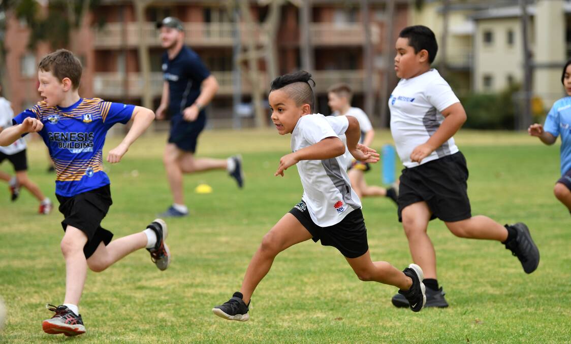 Giving it a go: Kids particpating in the NSW Rugby League's Try League program. Picture: Supplied.