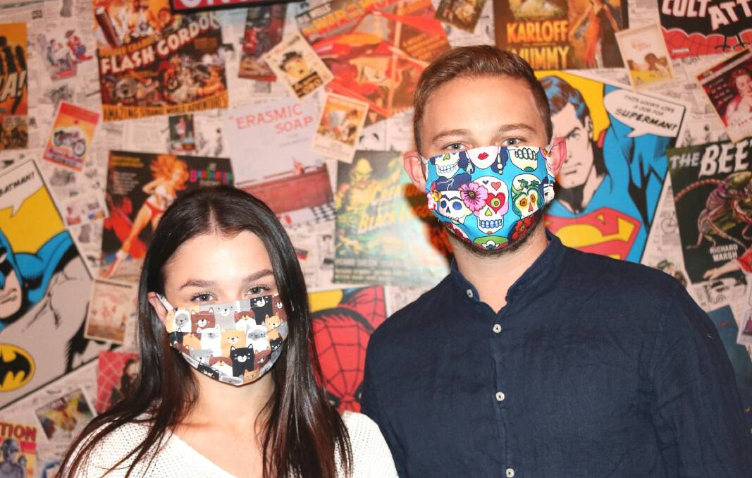 Masked: Shannon Law and Ethan Brookes with their Happy Masks. Picture: Supplied.