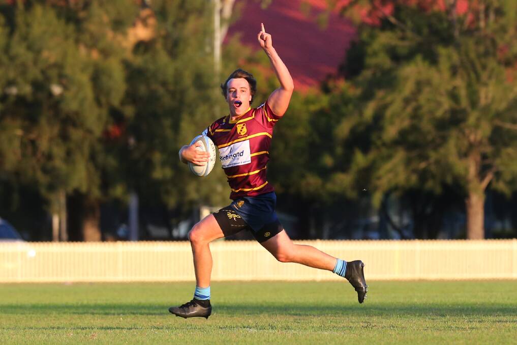 Try scorer: HAC First Grade winger Jack Fleetwood slides in for one of his three tries on Saturday helping his side get the win. Picture: Geoff Jones.
