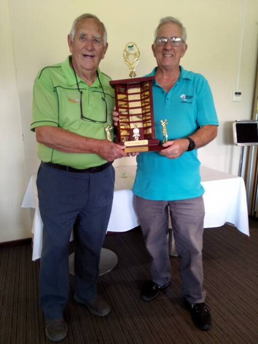Award: Richmond Golf Club Veterans president Noel Byles presents the Heritage Cup to Glenmore Heritage Valley Golf Club team member Peter Murphy. Picture: Richmond Golf Club