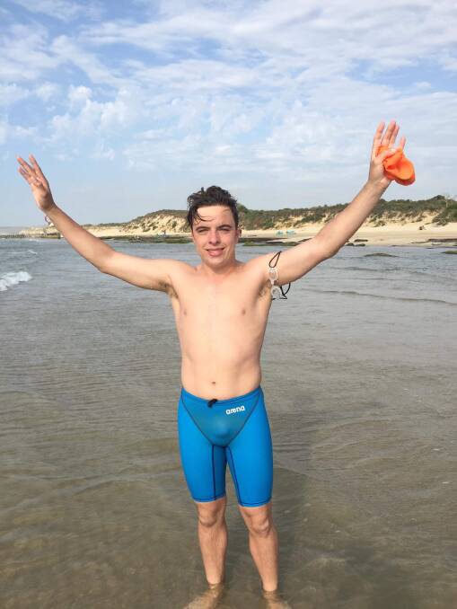 Finished: Michael Payne upon arriving on the coast in France, completing the swim. Picture: Supplied