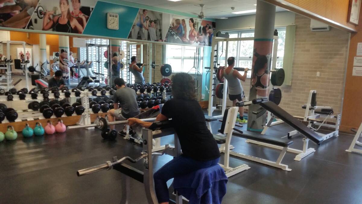 Working out: Gym-goers make use of the gyms that have reopened.